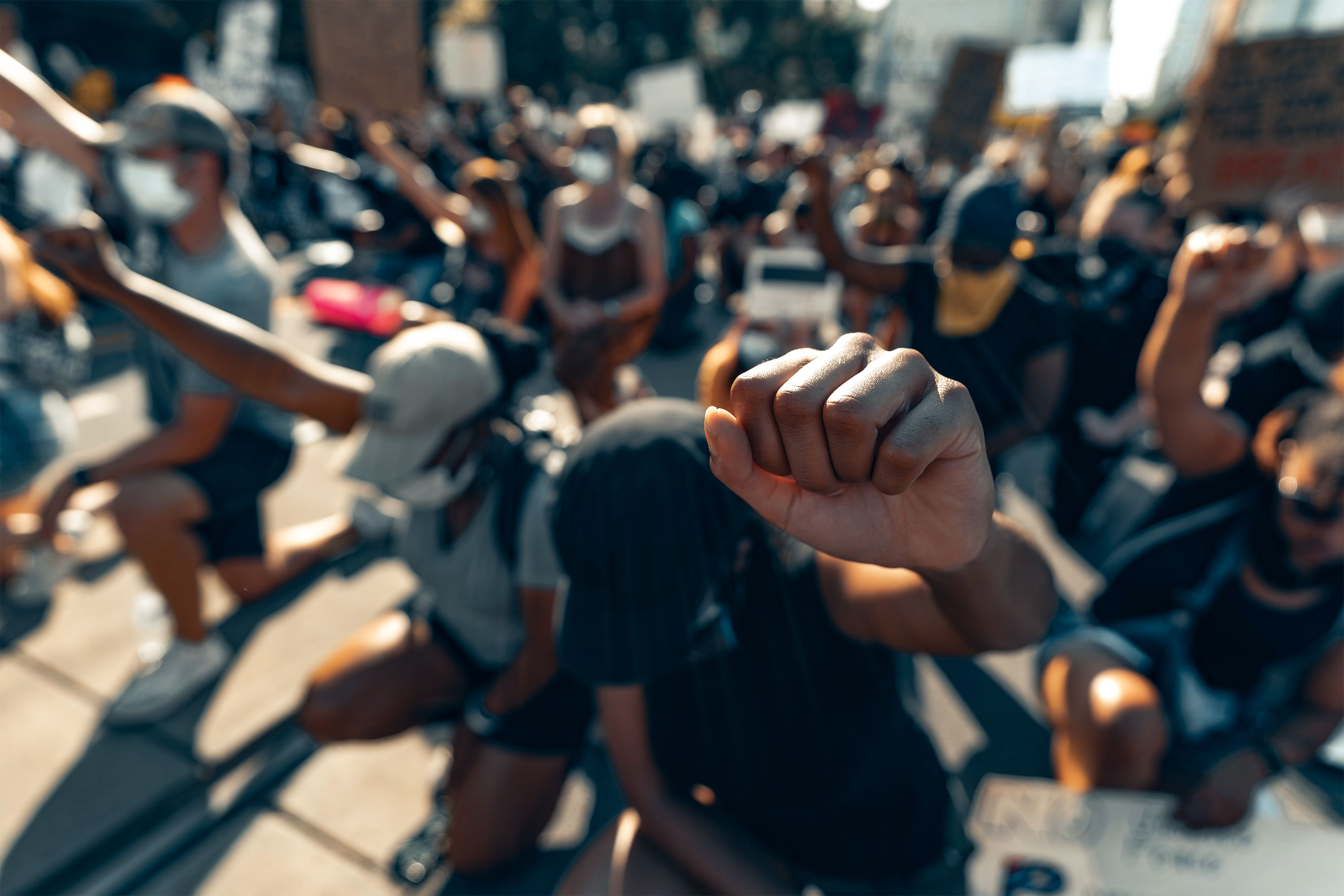 protestors in Charlotte, NC kneel for George Floyd